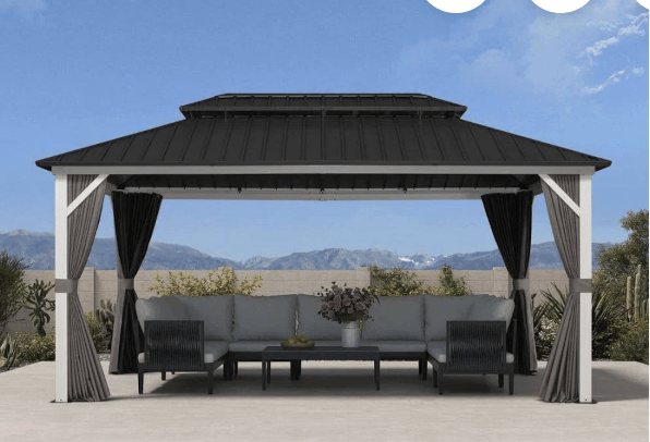 White-framed PURPLE LEAF hardtop gazebo with a dark double roof and outdoor seating underneath.
